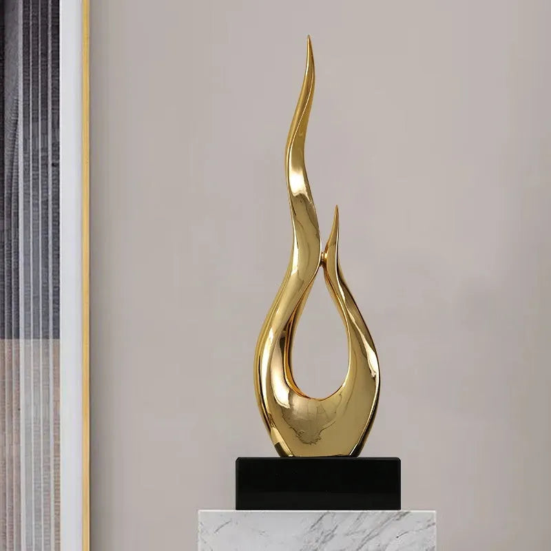 Resin festival high-rise decoration craft in bright gold colour with modern simple design