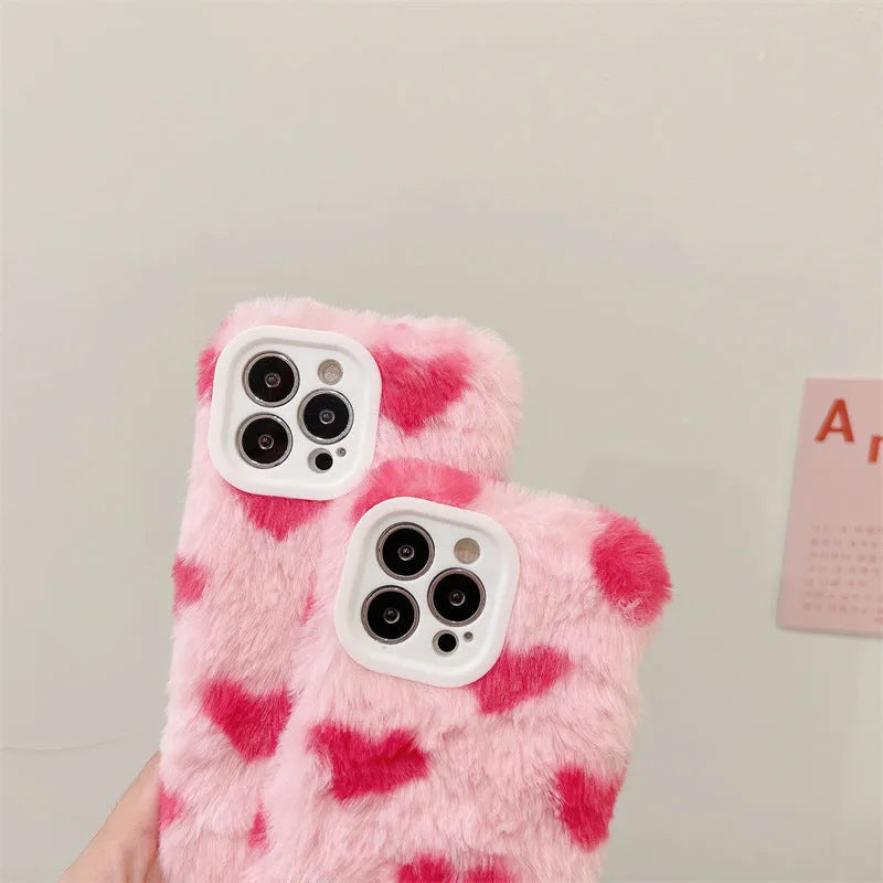 Pink silicone iPhone case with a cartoon design on the back.