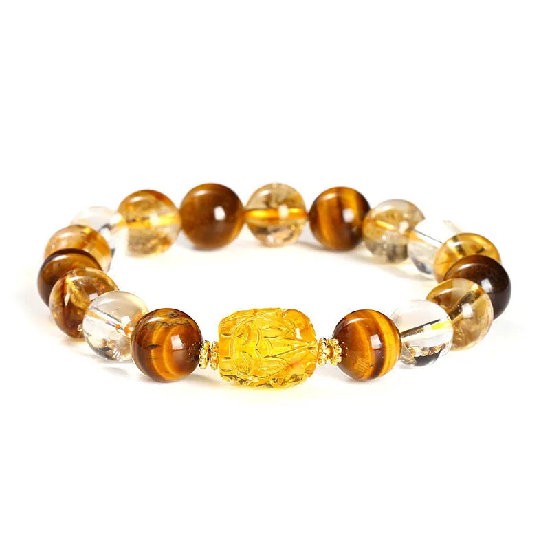 Close-up of a yellow tiger's eye and citrine gemstone bracelet with 10mm round beads and a steel clasp.