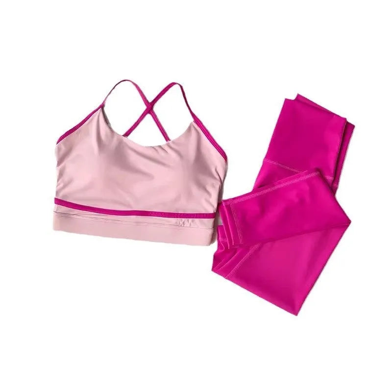 Women's blue and white quick-dry nylon spandex yoga pants and sleeveless tank top set for fitness.