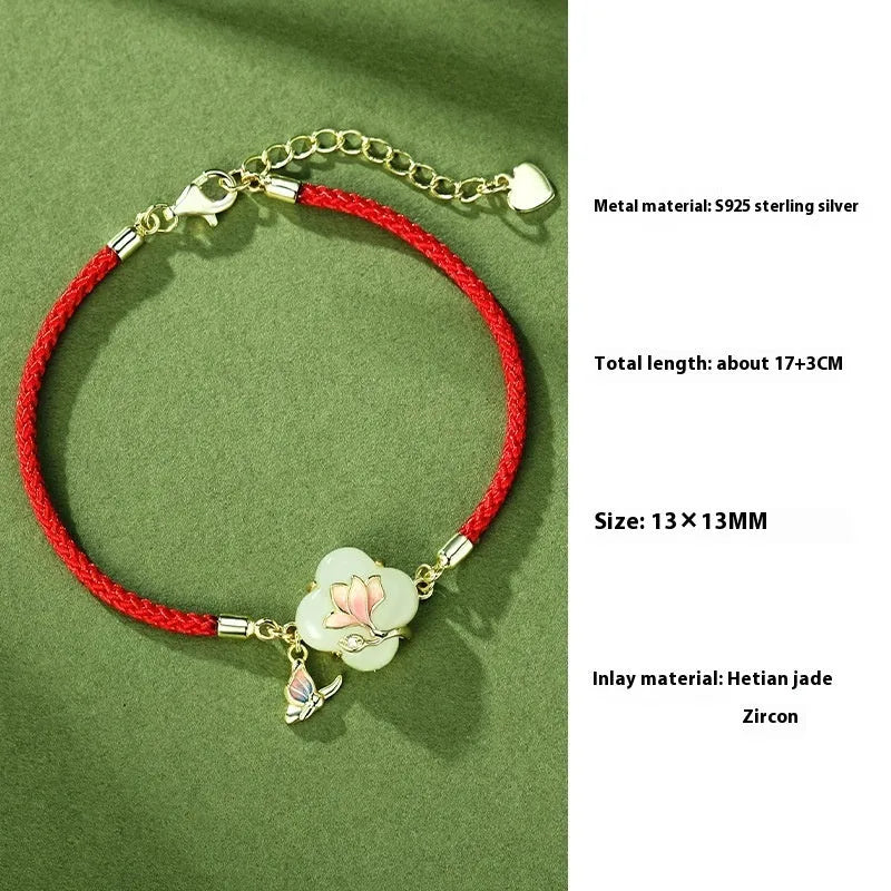 S925 sterling silver magnolia Hetian Jade jewellery set with necklace, bracelet, and ear studs.