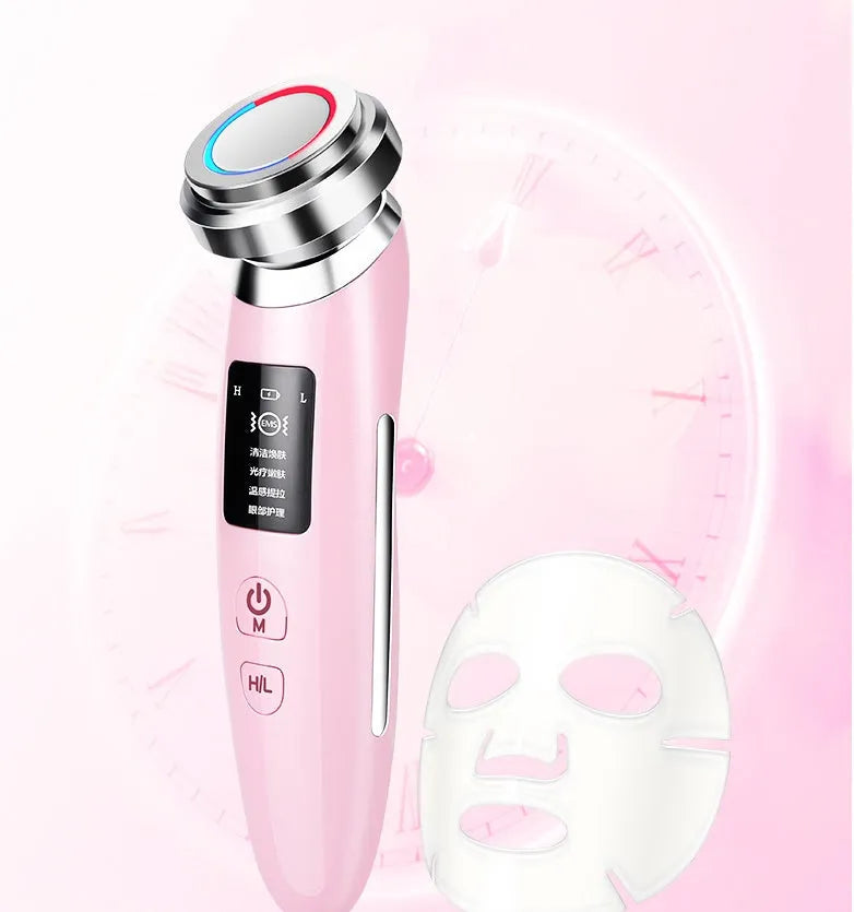 Pink cleansing and rejuvenating beauty instrument measuring 185mm long