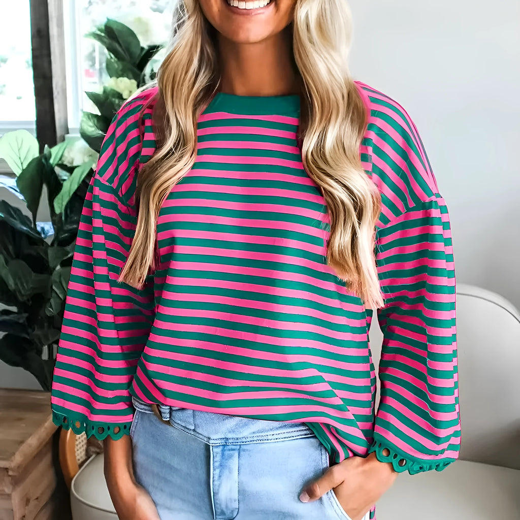 Women's striped crew neck long sleeve top in black loose fit polyester front view