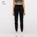 Women's high-waist yoga pants in a cotton blend with a drawstring waist, shown in Belgian Blue colour.