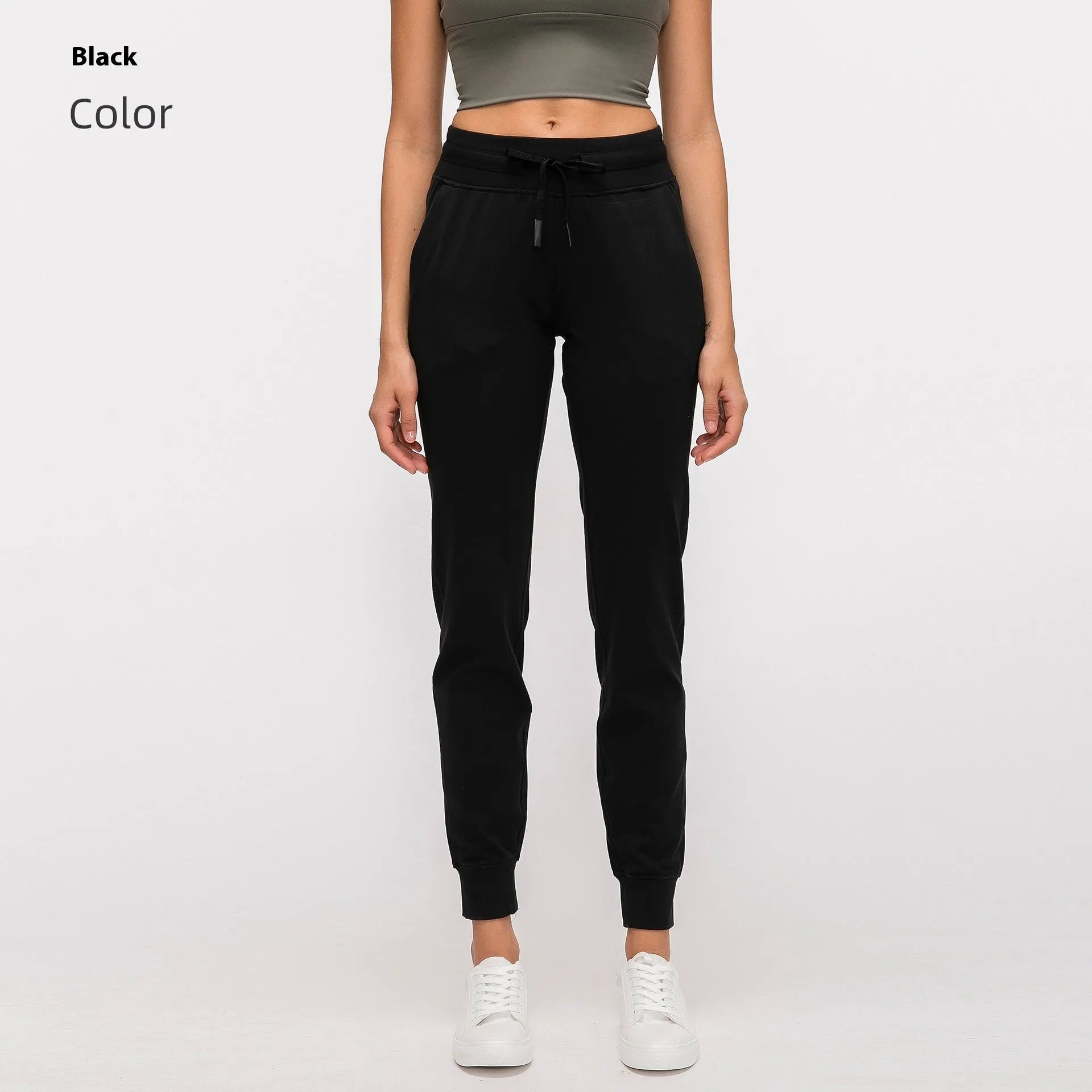 Women's high-waist yoga pants in a cotton blend with a drawstring waist, shown in Belgian Blue colour.