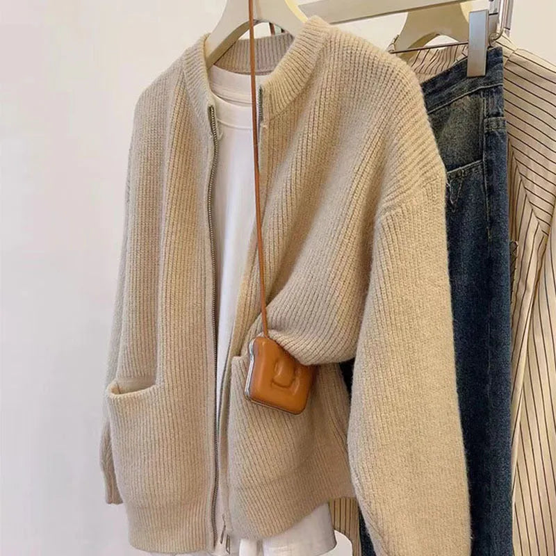 Beige long sleeve cardigan-style sweater coat made from soft viscose fibre fabric.