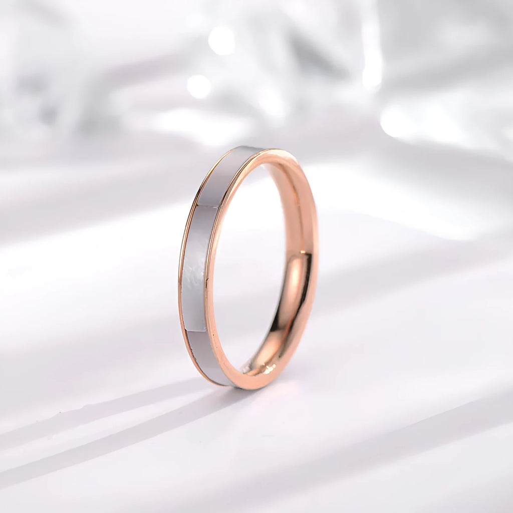 Titanium steel women's geometric ring with white shell inlay and electroplated finish