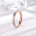 Titanium steel women's geometric ring with white shell inlay and electroplated finish