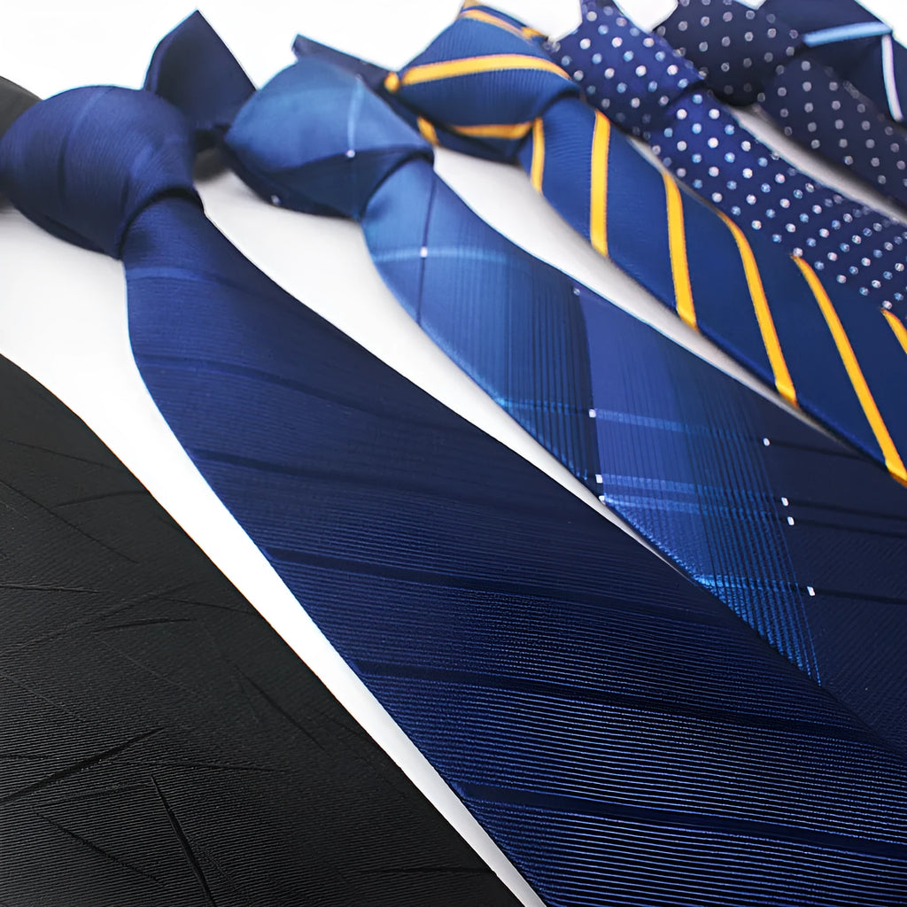 Close-up of a striped jacquard tie showing its textured pattern and arrow shape.
