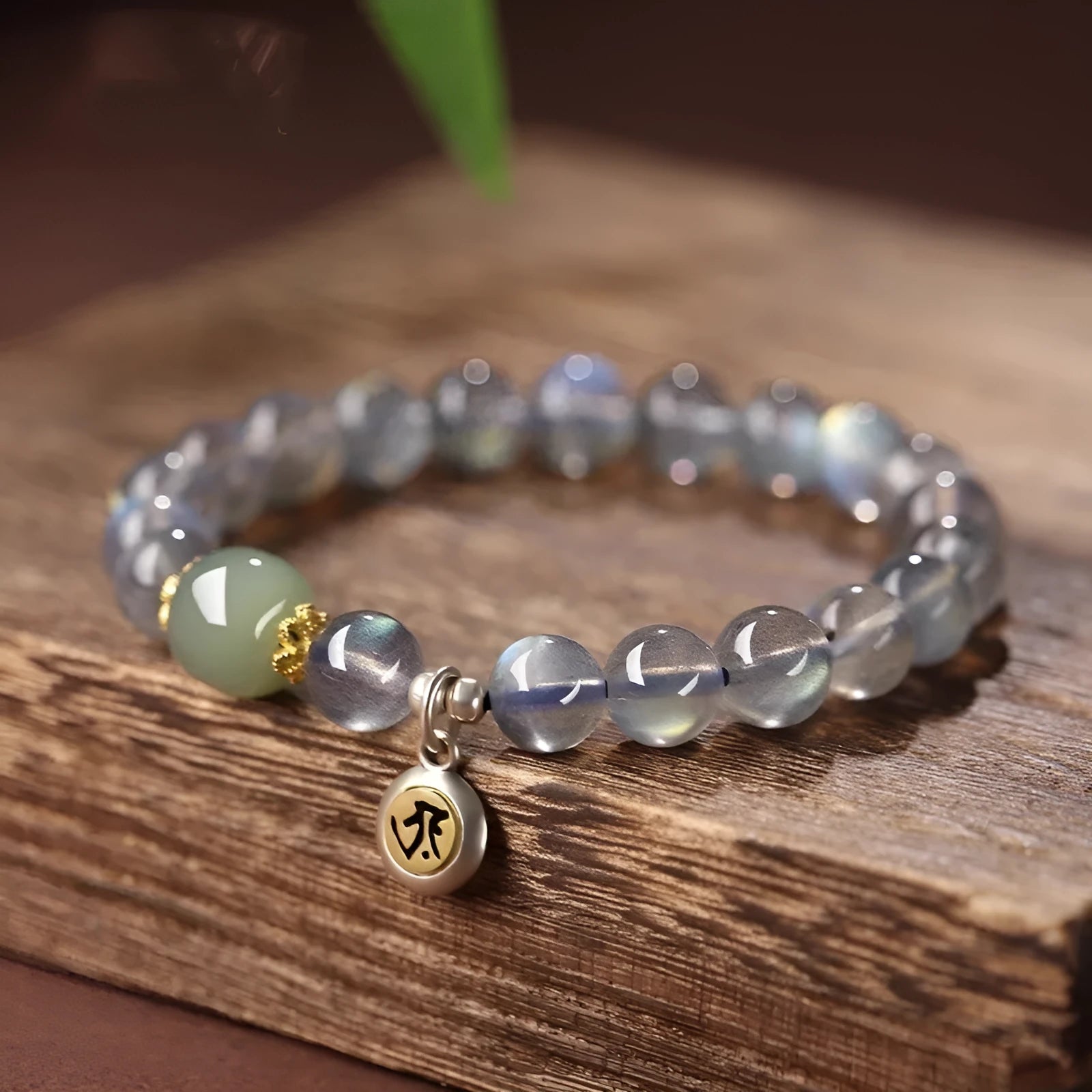 Moonstone birth Buddha bracelet with 8mm bead and Thousand-Hand Kwan-yin mouse zodiac design