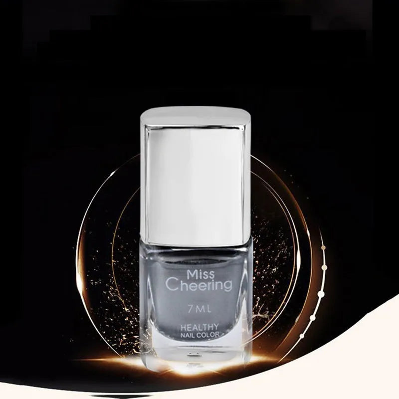 Mirror Nail Polish bottle with brush applicator for reflective metallic silver-tone nail finish