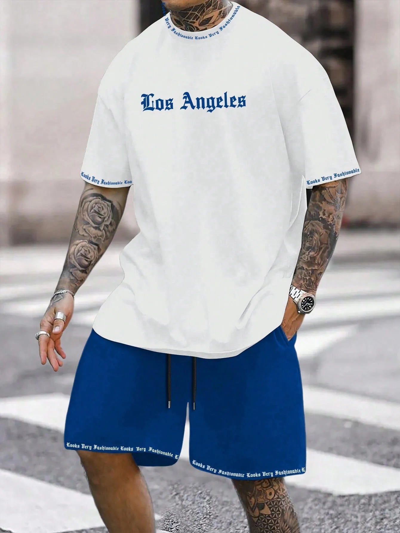 Men's blue printed short-sleeved top and matching shorts, a sports style co-ord set in quick-dry fabric.