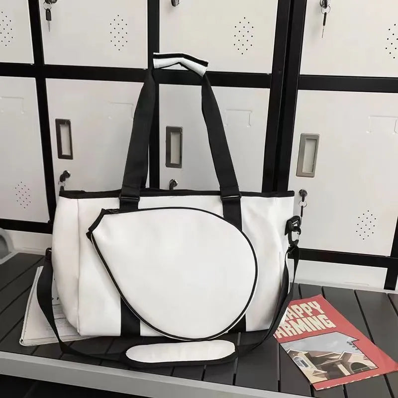 Leather one-shoulder retro badminton bag for women shown in dark brown colour.