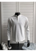 Men's grey polo shirt with patchwork detailing on shoulders and stand-up collar