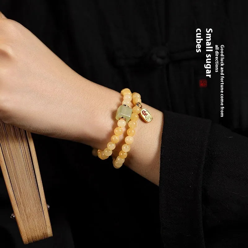 Women's hand-woven bracelet with topaz mantra barrel beads and square sugar jade beads