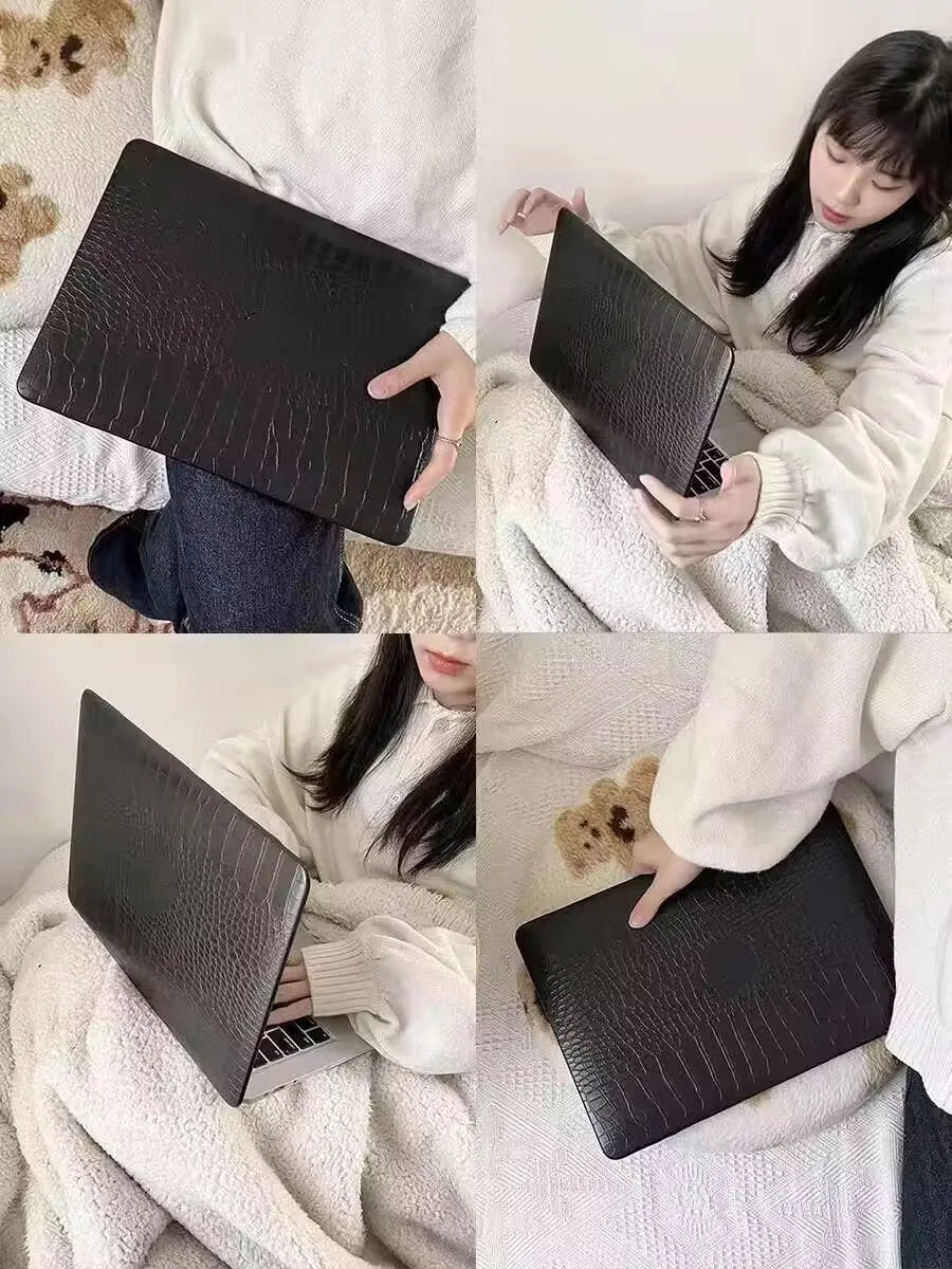MacBook laptop case with crocodile pattern texture in black, white, or soft pink, showing hollowed Apple logo.