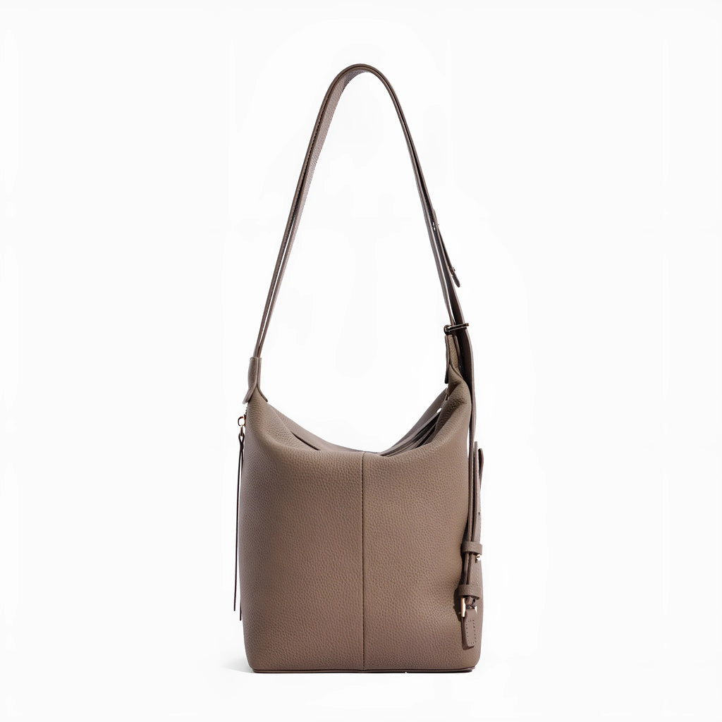 Women's genuine leather bucket shoulder bag in elephant grey colour showing soft construction