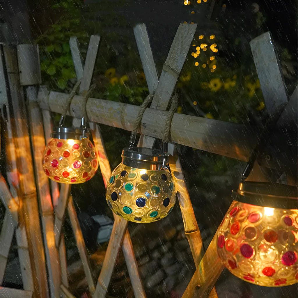 Solar decorative wave point outdoor night light IP65 waterproof in blue colour on a garden table