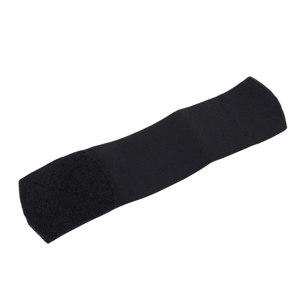 Adjustable red rubber football shin guard belt strap securing a shin pad