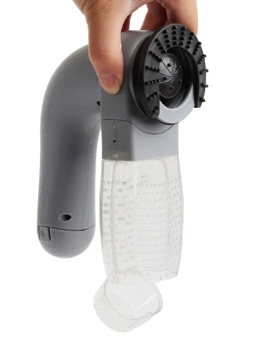Grey electric pet hair vacuum grooming brush with rubber head and collection canister