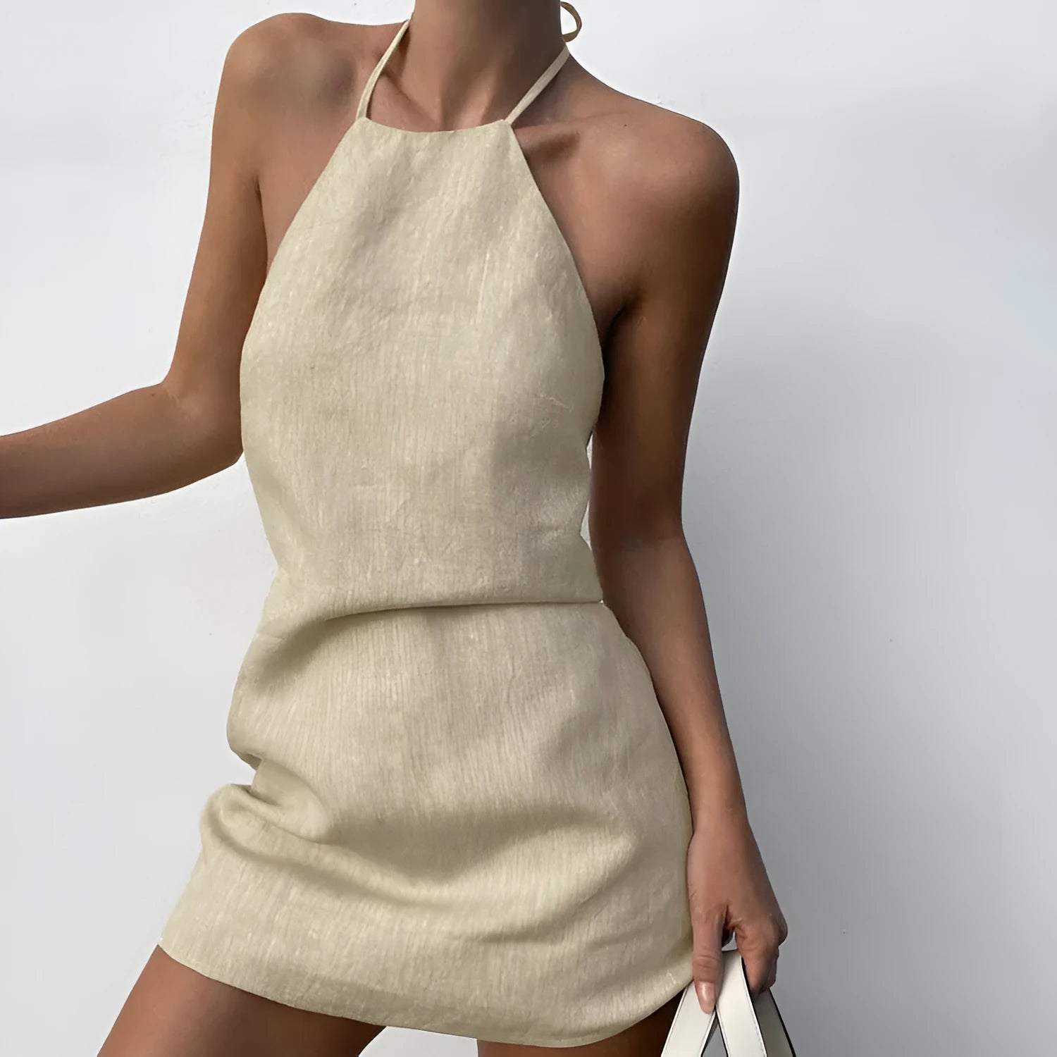 Women's solid colour cotton-linen summer dress with A-line skirt silhouette on hanger