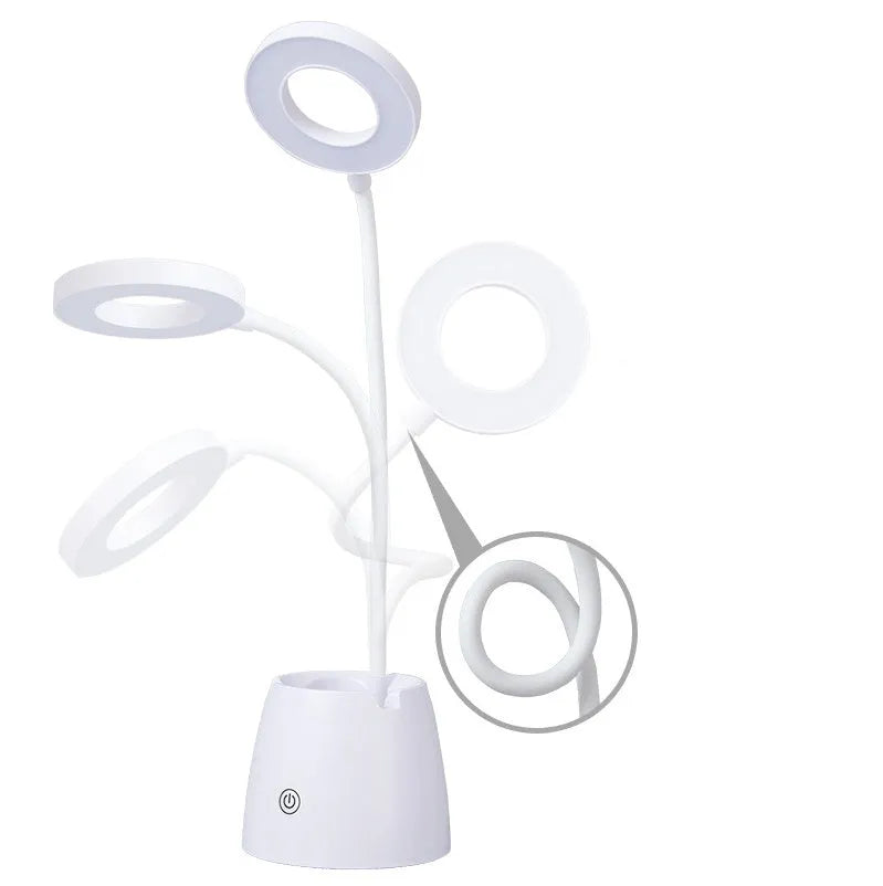 LED folding eye protection table lamp in beige, white, or three colour, with aluminium and ABS body, 8W output, and rechargeable battery