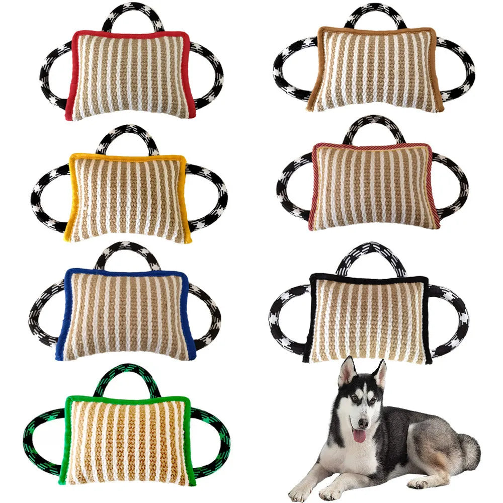 Colourful dog tug toy with a jute bite pillow centre and three rope handles.
