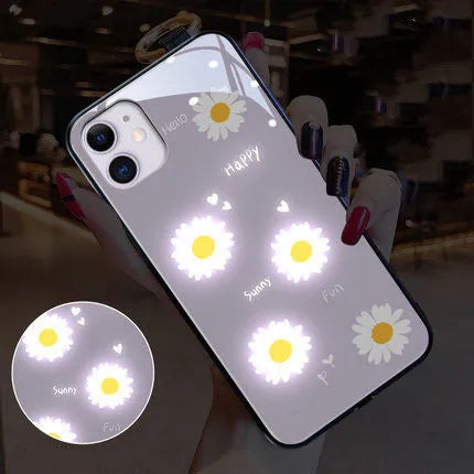 Luminous voice-activated iPhone case with painted daisy and broken flower designs on TPU protective shell