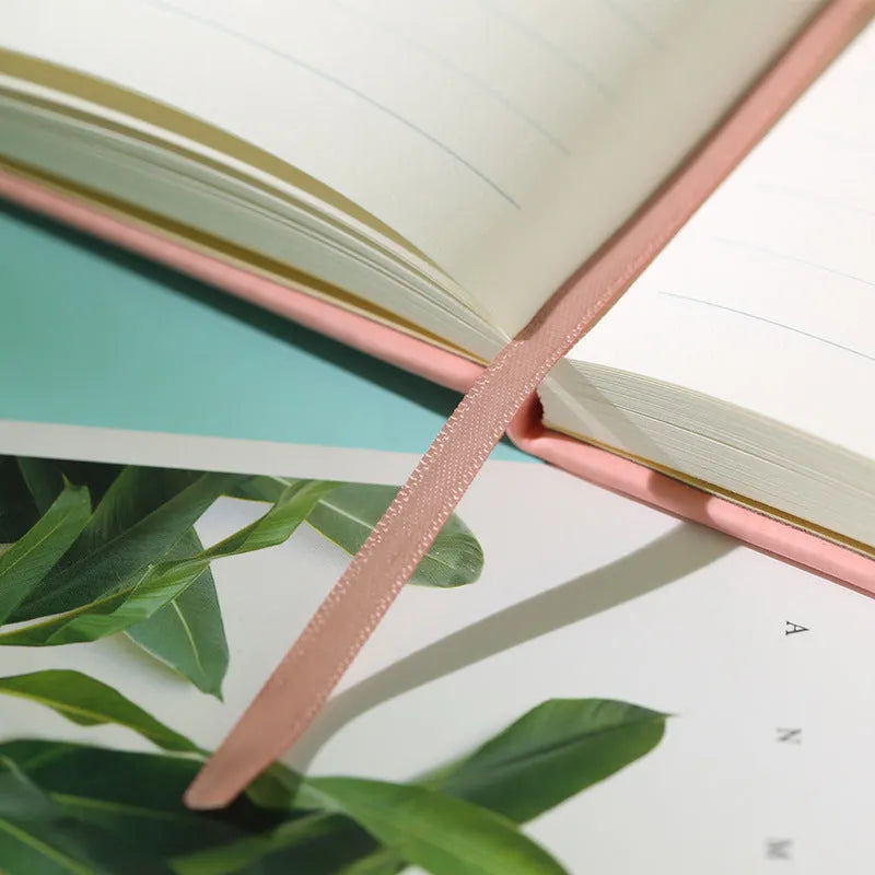 A5 tactile PU hardcover notebook with 96 sheets, available in multiple colours including black and champagne gold