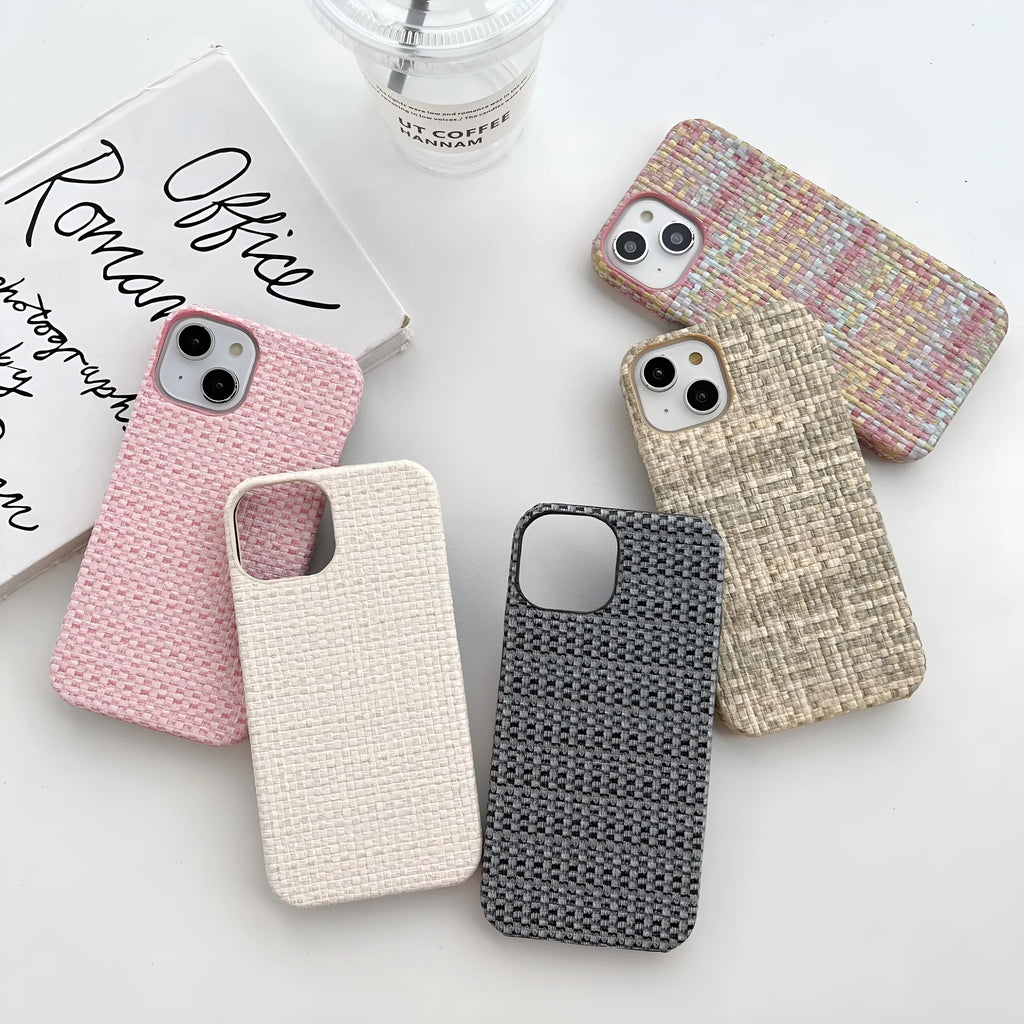 Hand-woven plaid TPU phone case in pink, shown on iPhone, with textured grip pattern and all-inclusive edges.