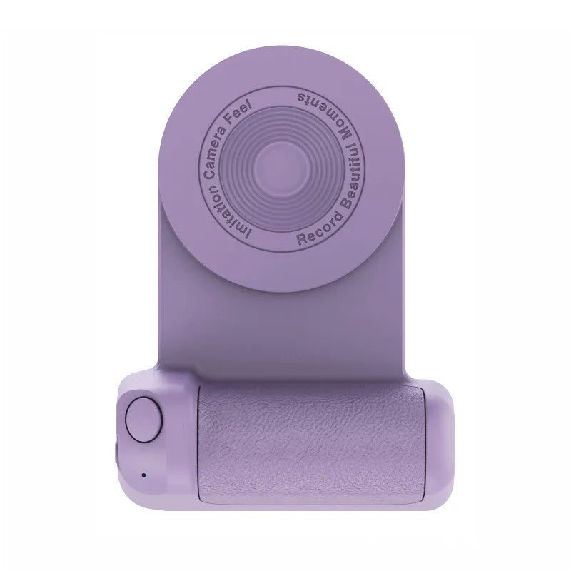 Black magnetic phone camera holder with rotatable grip on wooden table demonstrating phone attachment