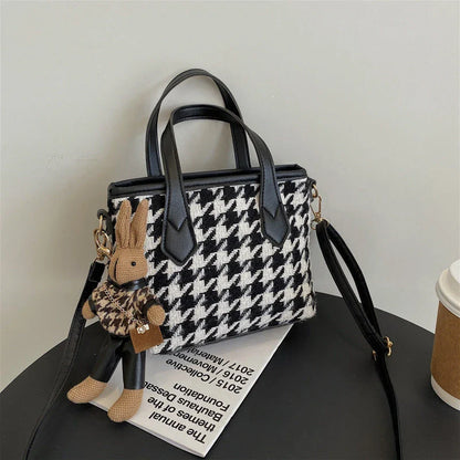 Stylish houndstooth shoulder bags in various colors, featuring a spacious square shape, adjustable strap, and classic checkerboard pattern.