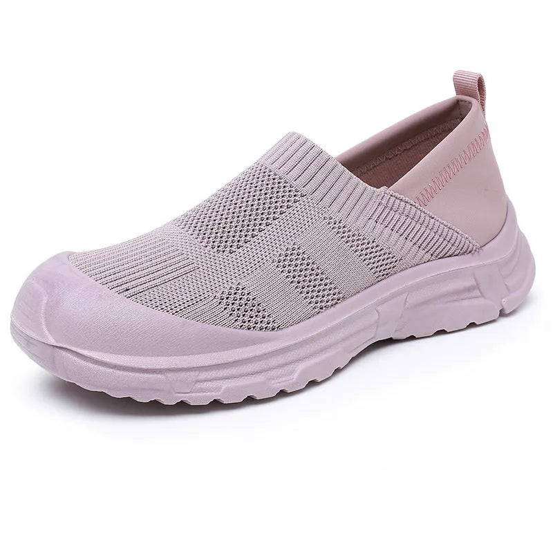 Women's black slip-on shoes with cloth uppers and soft PVC soles