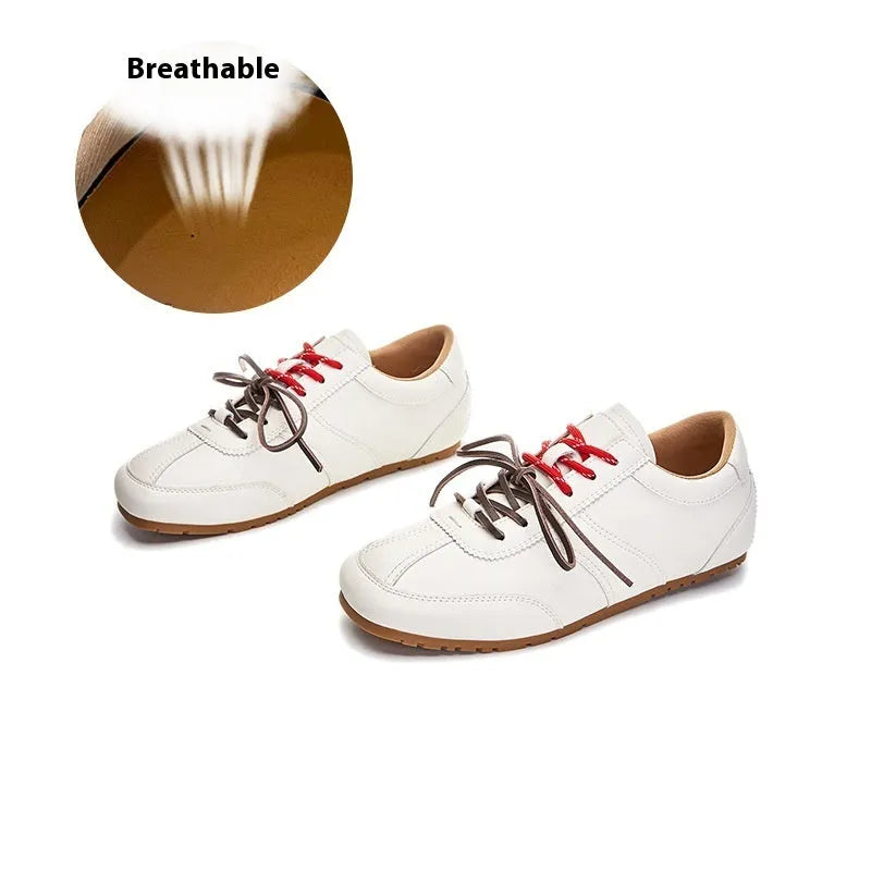Women's white casual lace-up shoes with horsehair flocked detailing on leather upper, flat heel and round toe.