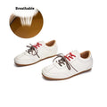 Women's white casual lace-up shoes with horsehair flocked detailing on leather upper, flat heel and round toe.