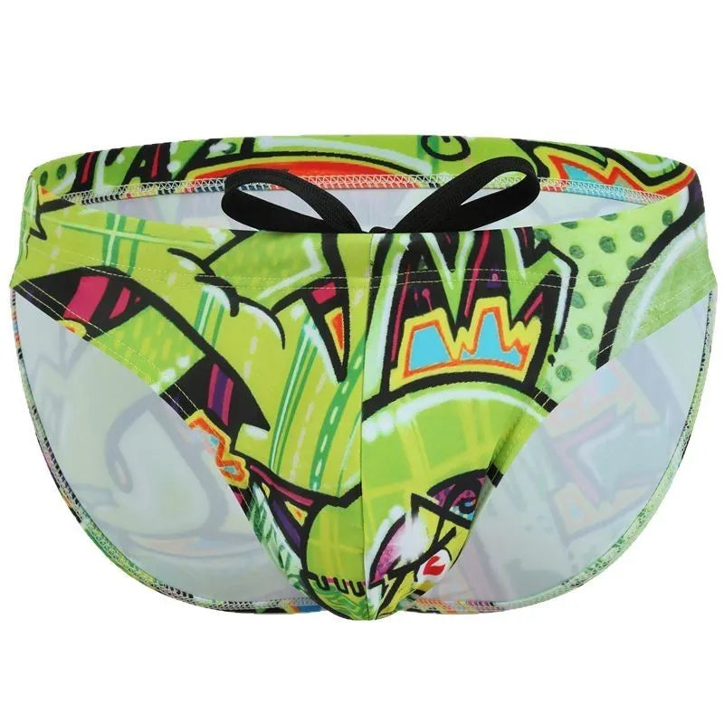 Men's printed polyester swimming trunks in a choice of four designs: Cyber, Ice Cream, Streamer, or Skull.