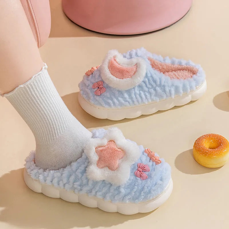 Light blue women's fleece-lined slippers with animal pattern, round toe, and thick sole.