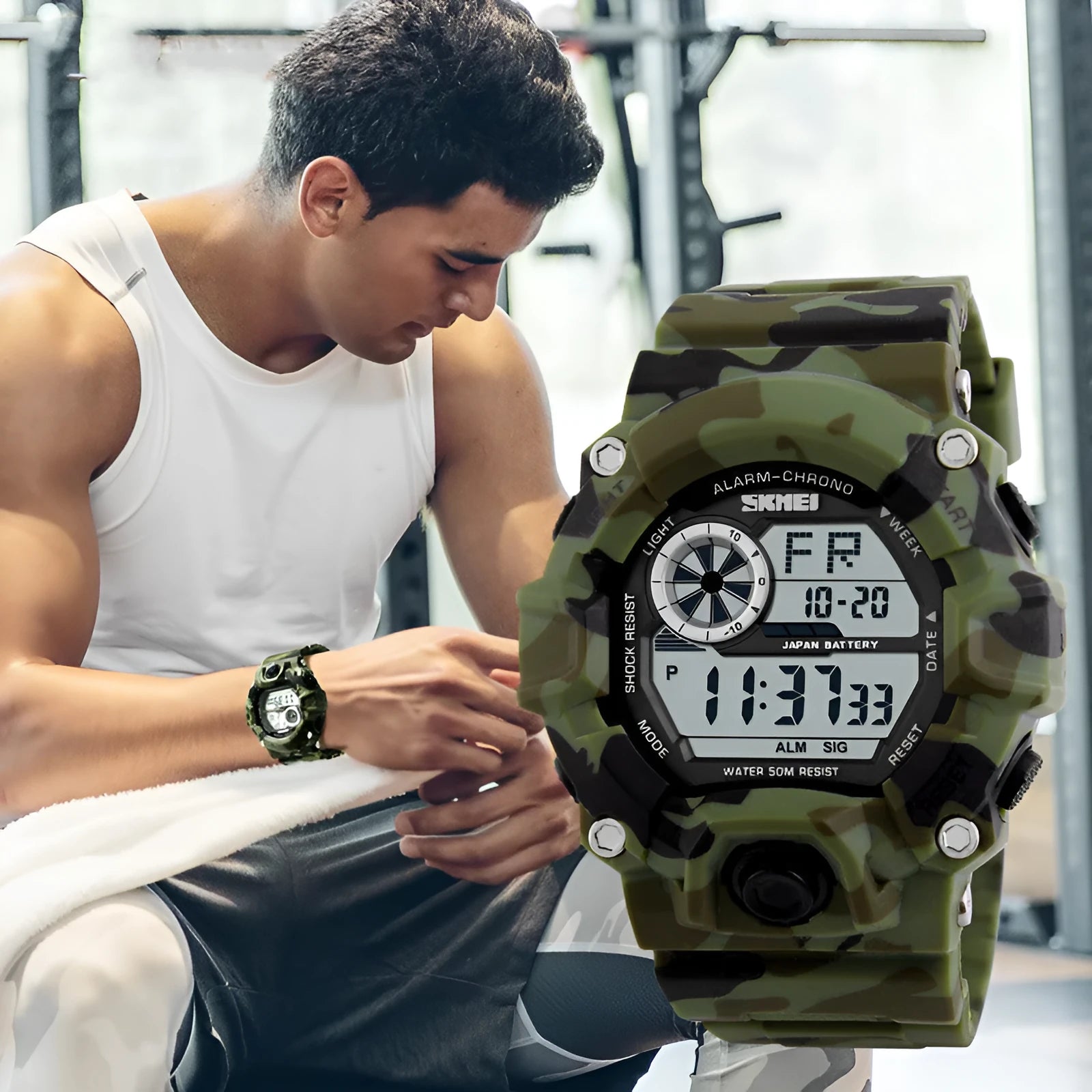 Electronic sports watch with round dial, plastic strap, and multifunctional display showing 30M waterproof rating