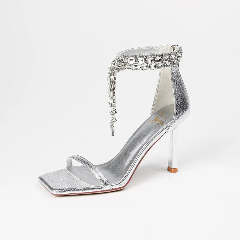 Women's silver ankle strap open toe sandals with square head design and 8cm heel