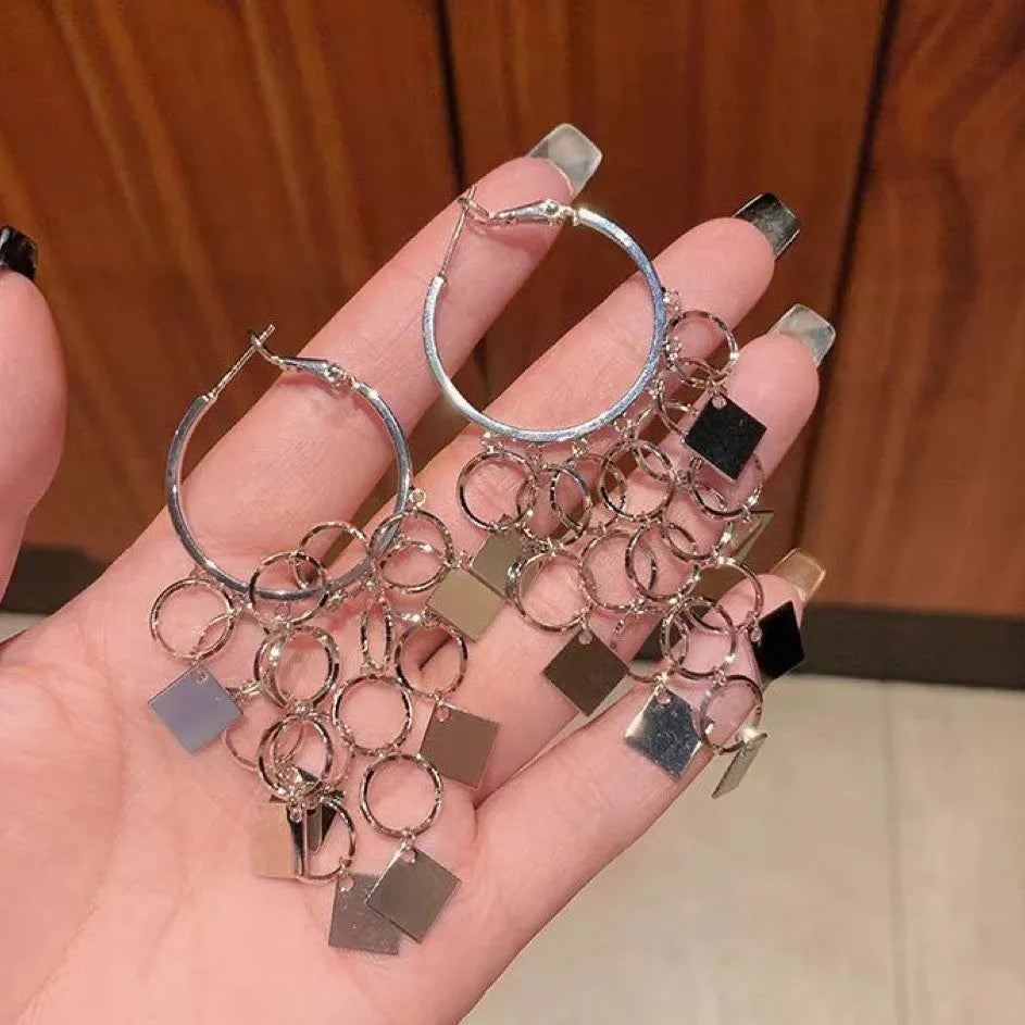 Women's diamond-shaped tassel earrings in gold or silver made from copper with electroplated finish