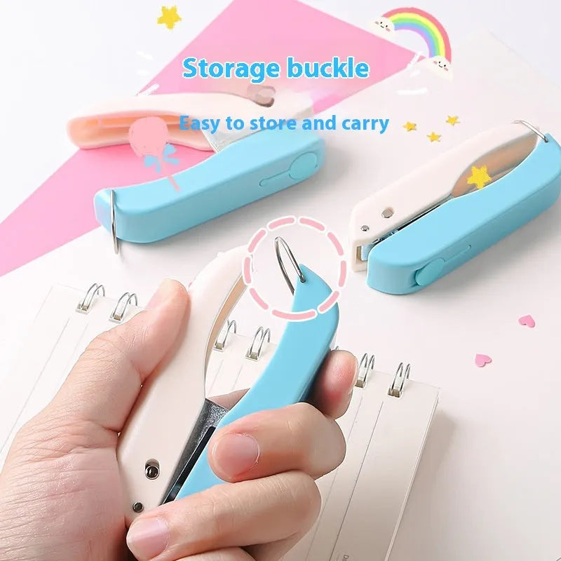 Small manual embossing punch machine for paper crafts showing Love, Star, and round pattern heads.