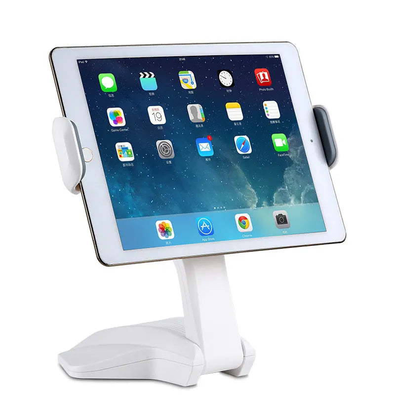 White adjustable tablet support stand with clip extended, holding a tablet on a desk.