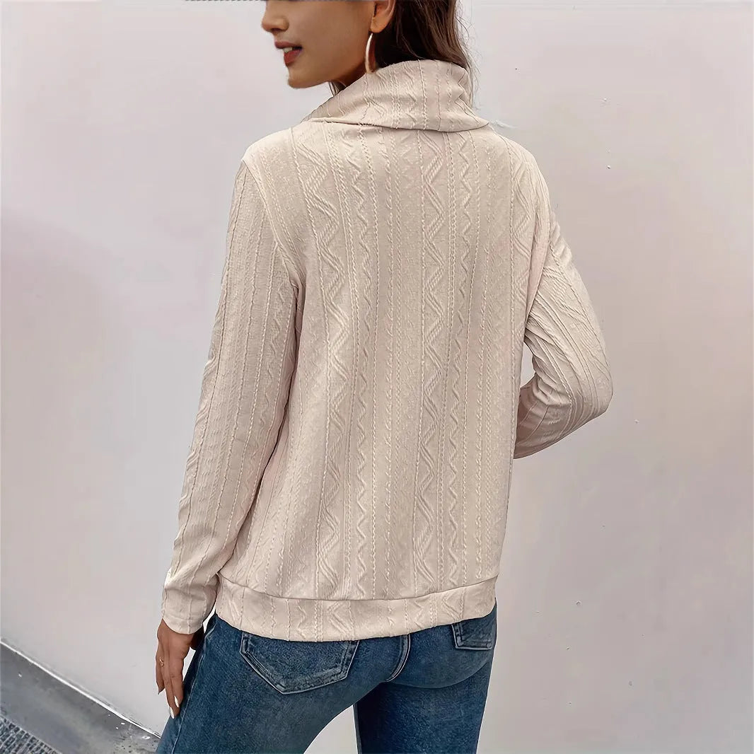 Apricot-coloured women's pullover hoodie with a drawstring hood and long sleeves laid flat.