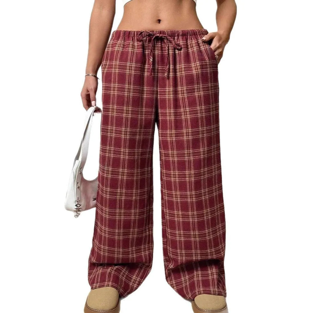 Women's casual trousers with drawstring waist and plaid pockets in blue or red colour options