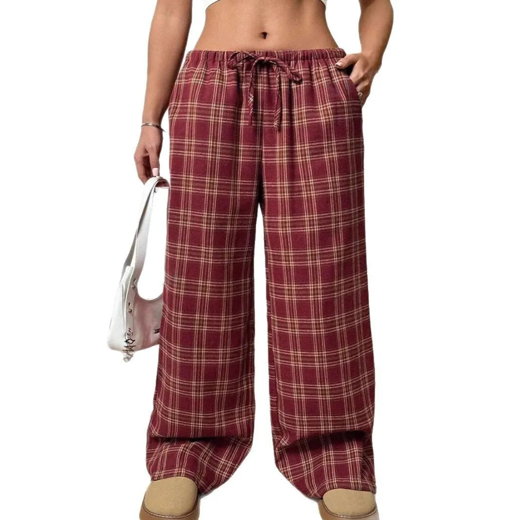 Women's casual trousers with drawstring waist and plaid pockets in blue or red colour options