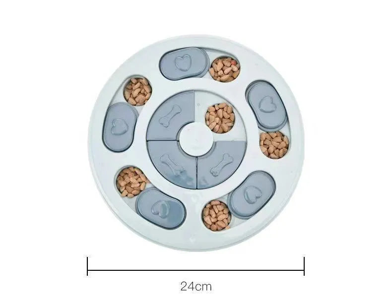 Pet puzzle feeder in pink plastic with non-slip base, measuring 24.2 cm wide, for slow dog feeding