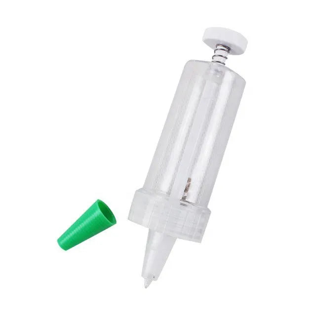 Green plastic mini garden seeder tool with adjustable thumb button, 12cm length