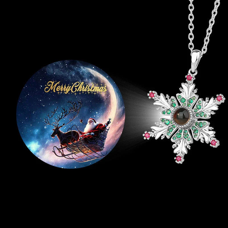 Sparkling copper snowflake projection pendant necklace with delicate chain, creating a magical winter wonderland display