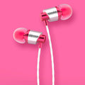 Black wired in-ear headphones with a 3.5mm plug, an in-line microphone, and silicone ear tips.