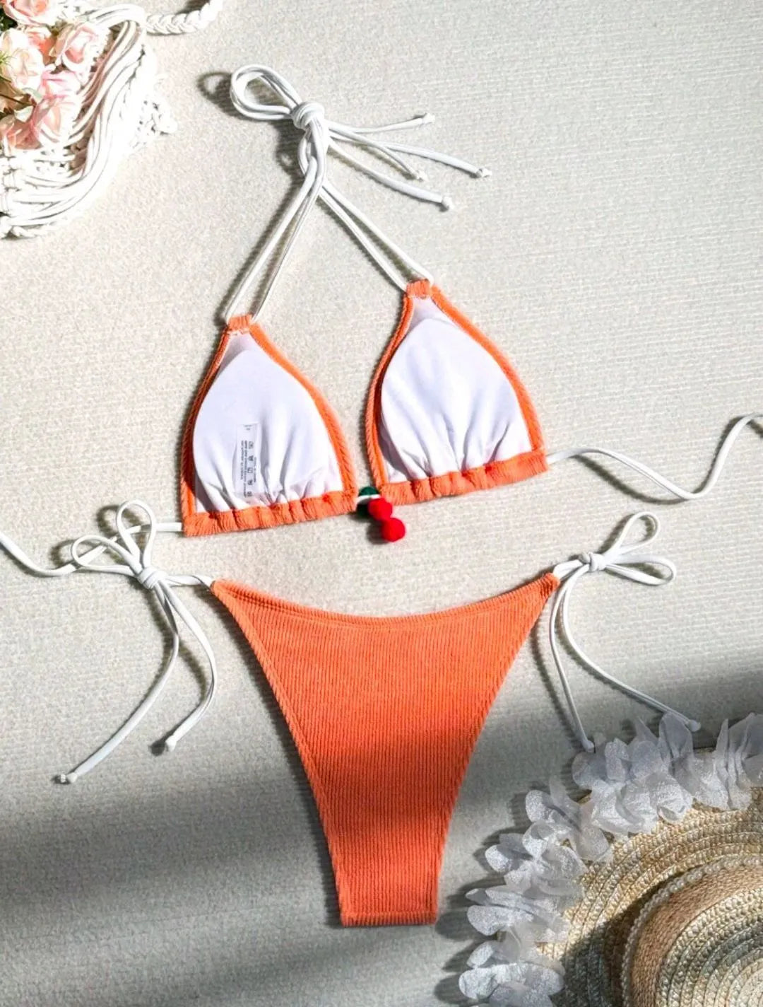 Women's solid colour bikini swimsuit in high elasticity fabric with backless briefs style design